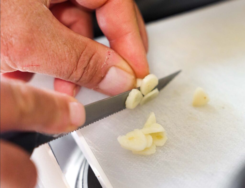 slicing garlic